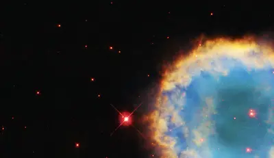 Planetarischer Nebel NGC 2438 vor dem offenen Sternhaufen Messier 46
